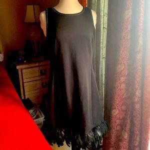Great cocktail dress with feather hem.